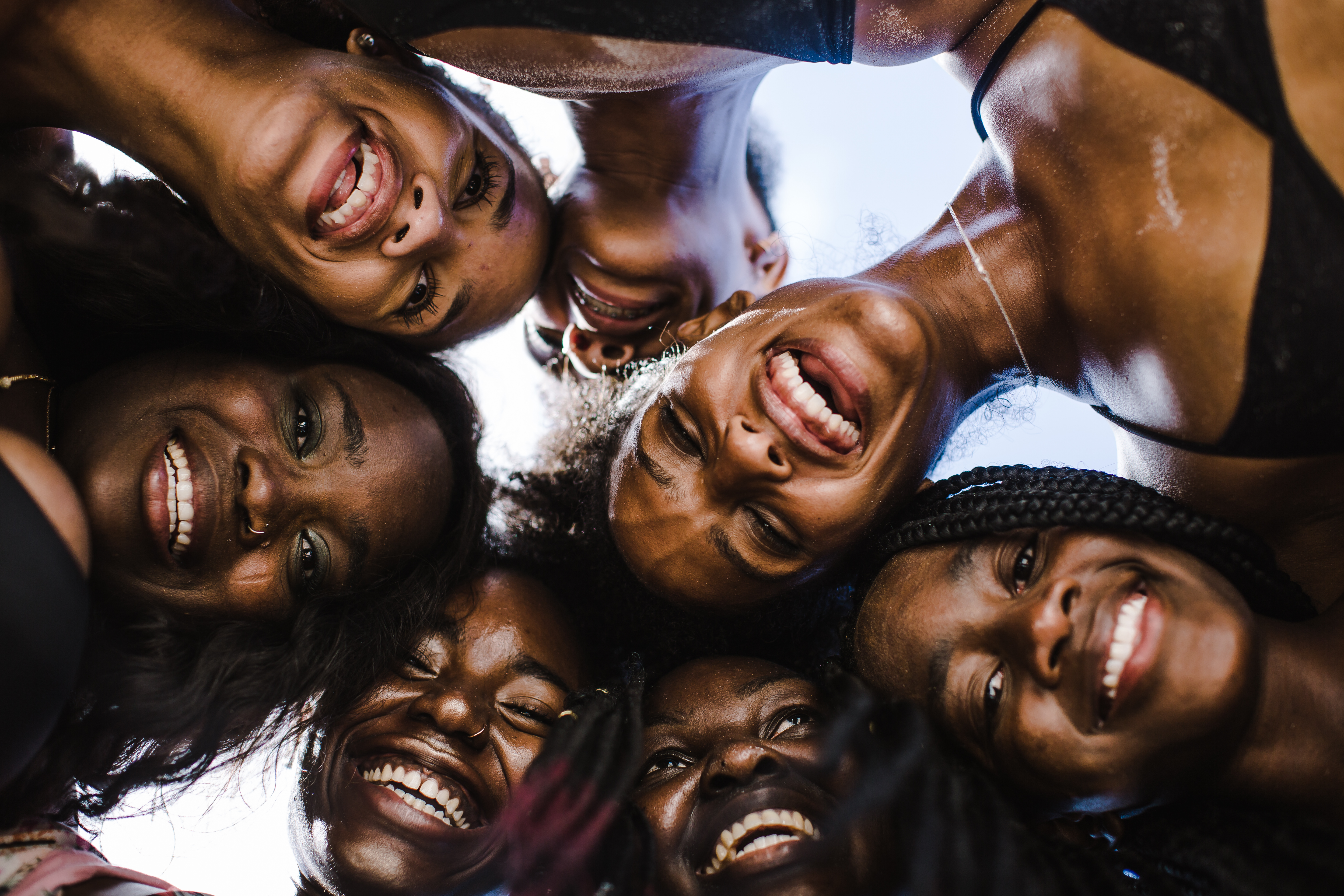 Seven Woman laughing in a group